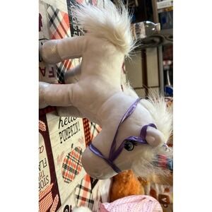 Plush White Horse Toy with Silver Hooves and Purple Harness